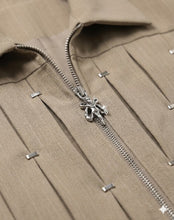 Blouson beige et decor metallic empiècement