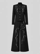 Ensemble noir et perles
