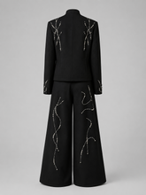 Ensemble noir et perles