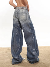 Coated silver denim